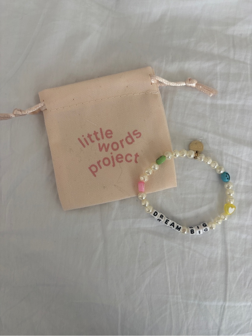 Little Words Project pearl bracelet saying “dream big”